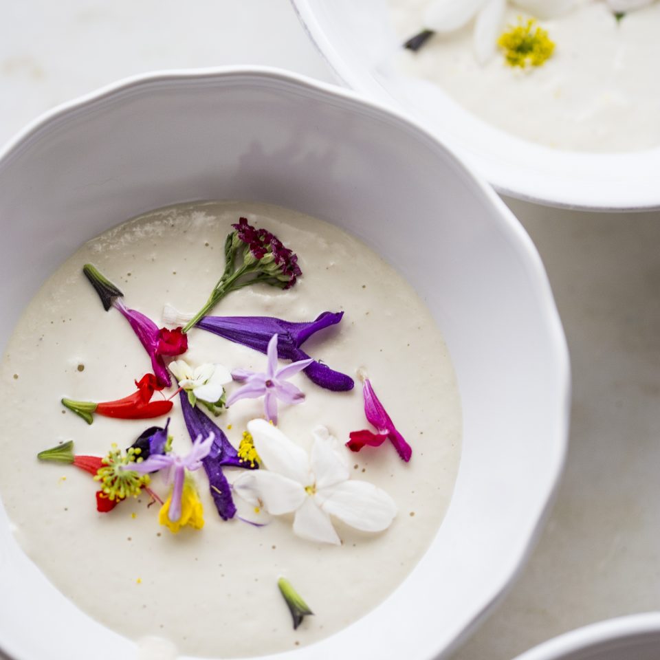 Cashew ajoblanco with edible flowers